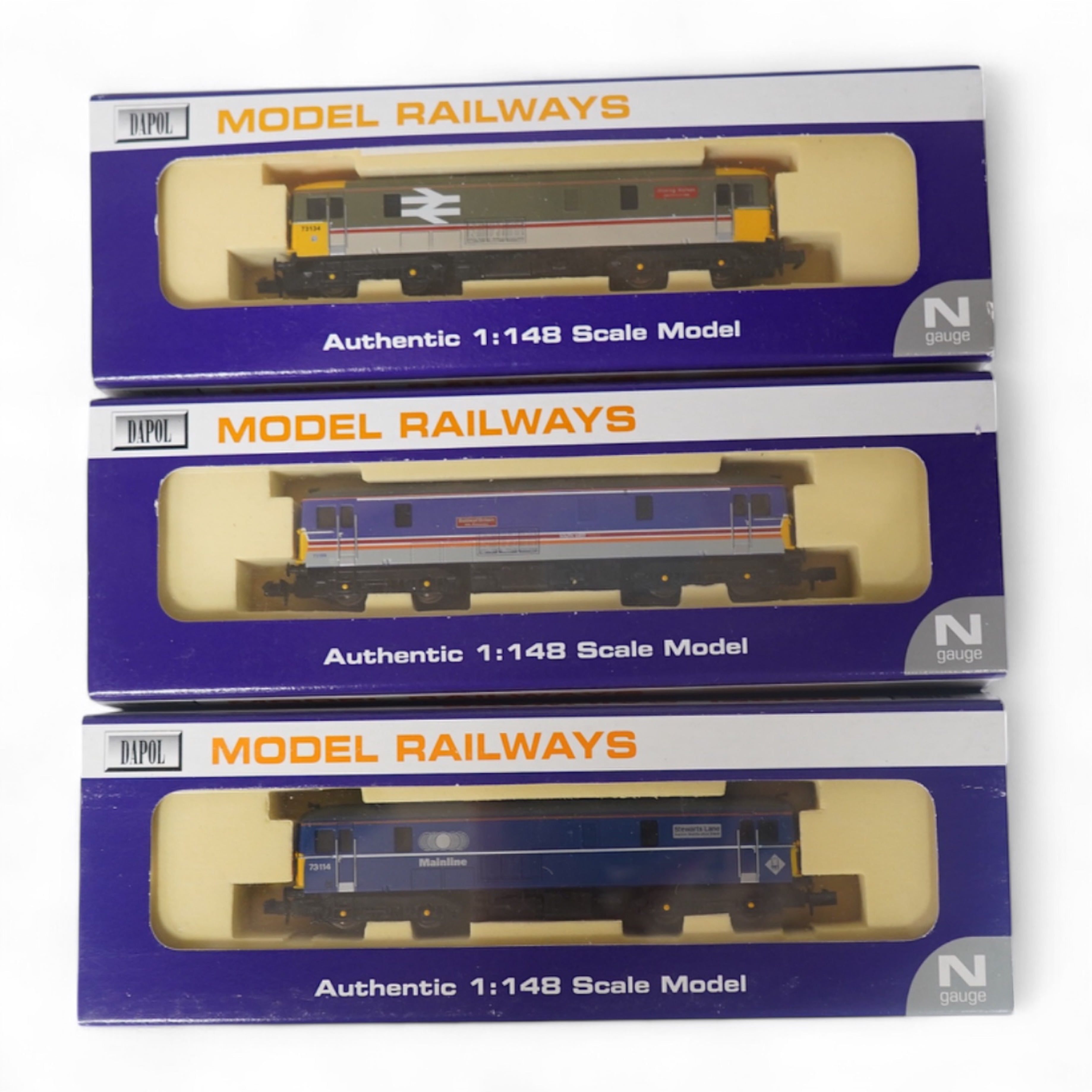 Three boxed Dapol N gauge railway Class 73 electro-diesel locomotives; 73109 Battle of Britain (ND006), 73114 Stewarts Lane (ND-021a) and 73134 Woking Homes (ND-007). Condition - good.